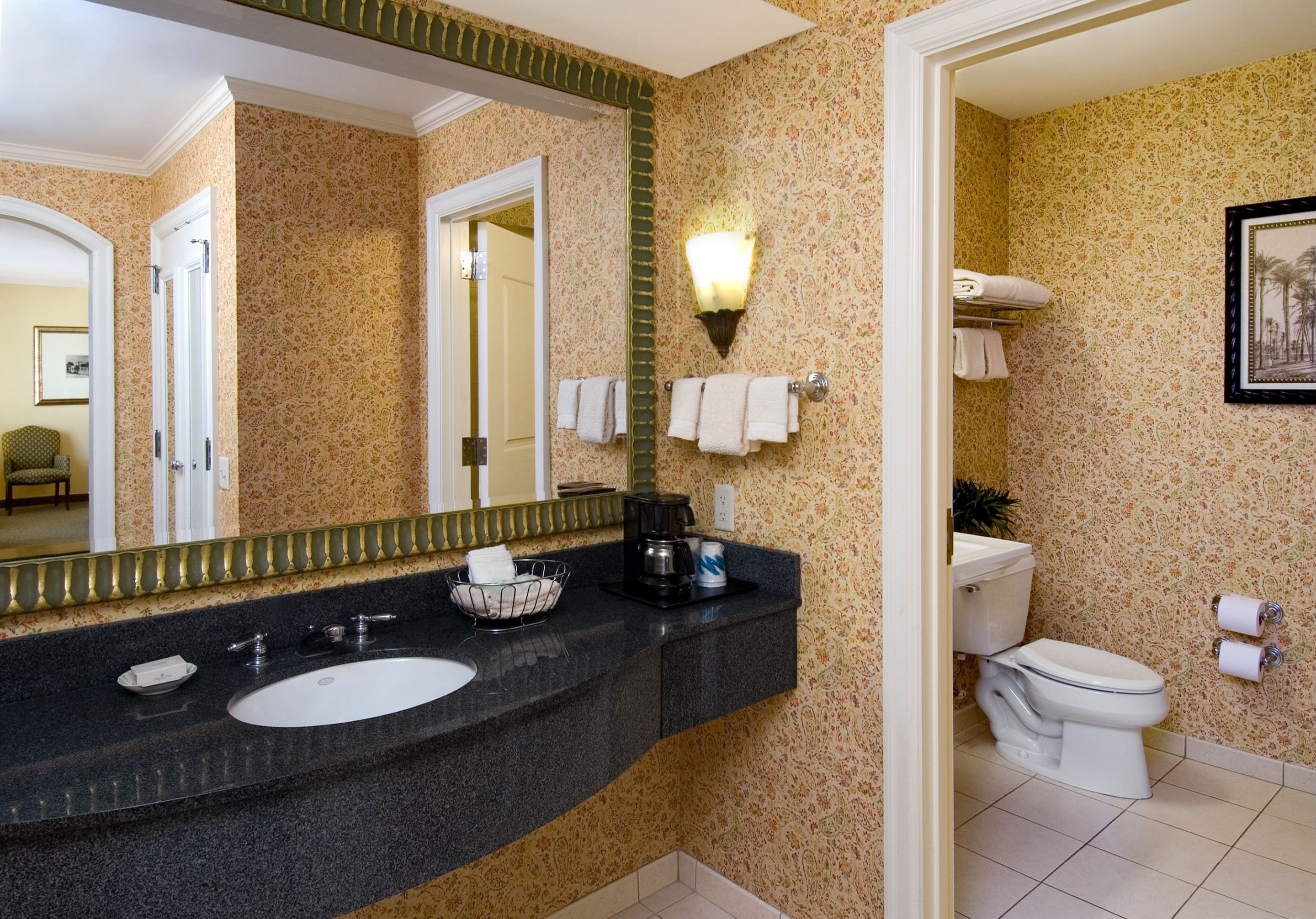 combined shower/bathtub, designer toiletries, hair dryer, towels