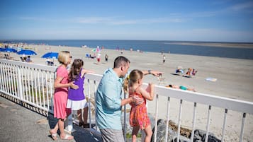 Guests can enjoy stunning ocean views from the beachside railing.