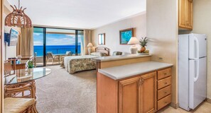 Junior Suite, 1 Queen Bed (Specific Unit May Vary) | Living room | 32-inch flat-screen TV with cable channels, TV, DVD player