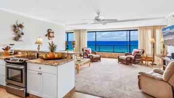 Standard Room, 1 Bedroom (Specific Unit May Vary) | Living area | 32-inch flat-screen TV with cable channels, TV, DVD player