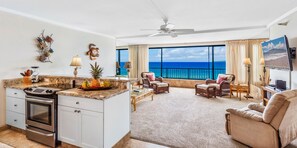 Standard Room, 1 Bedroom (Specific Unit May Vary) | Living area | 32-inch flat-screen TV with cable channels, TV, DVD player - Maui Kai (Lahaina)