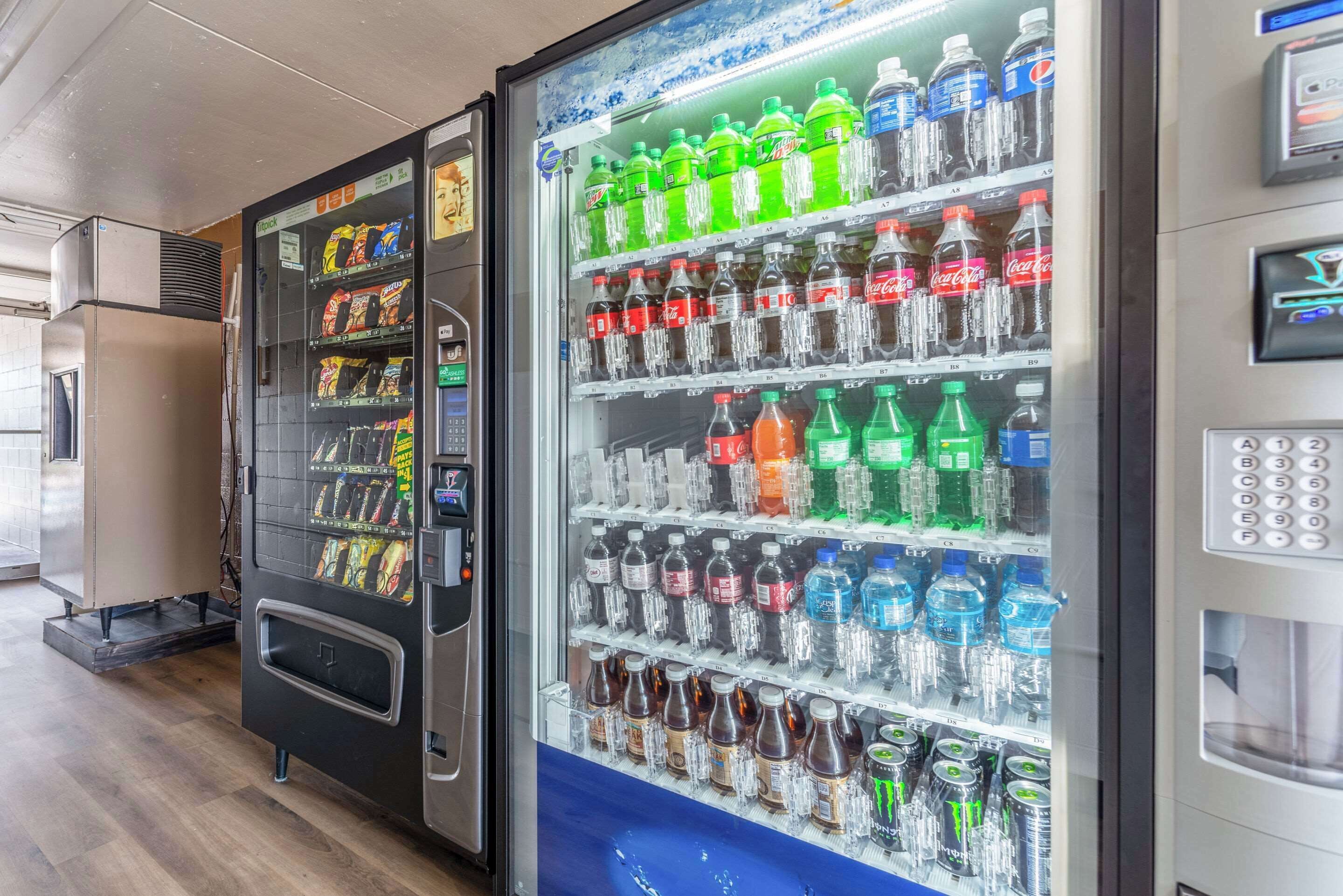 A vending machine with snacks and a beverage dispenser with various drinks.