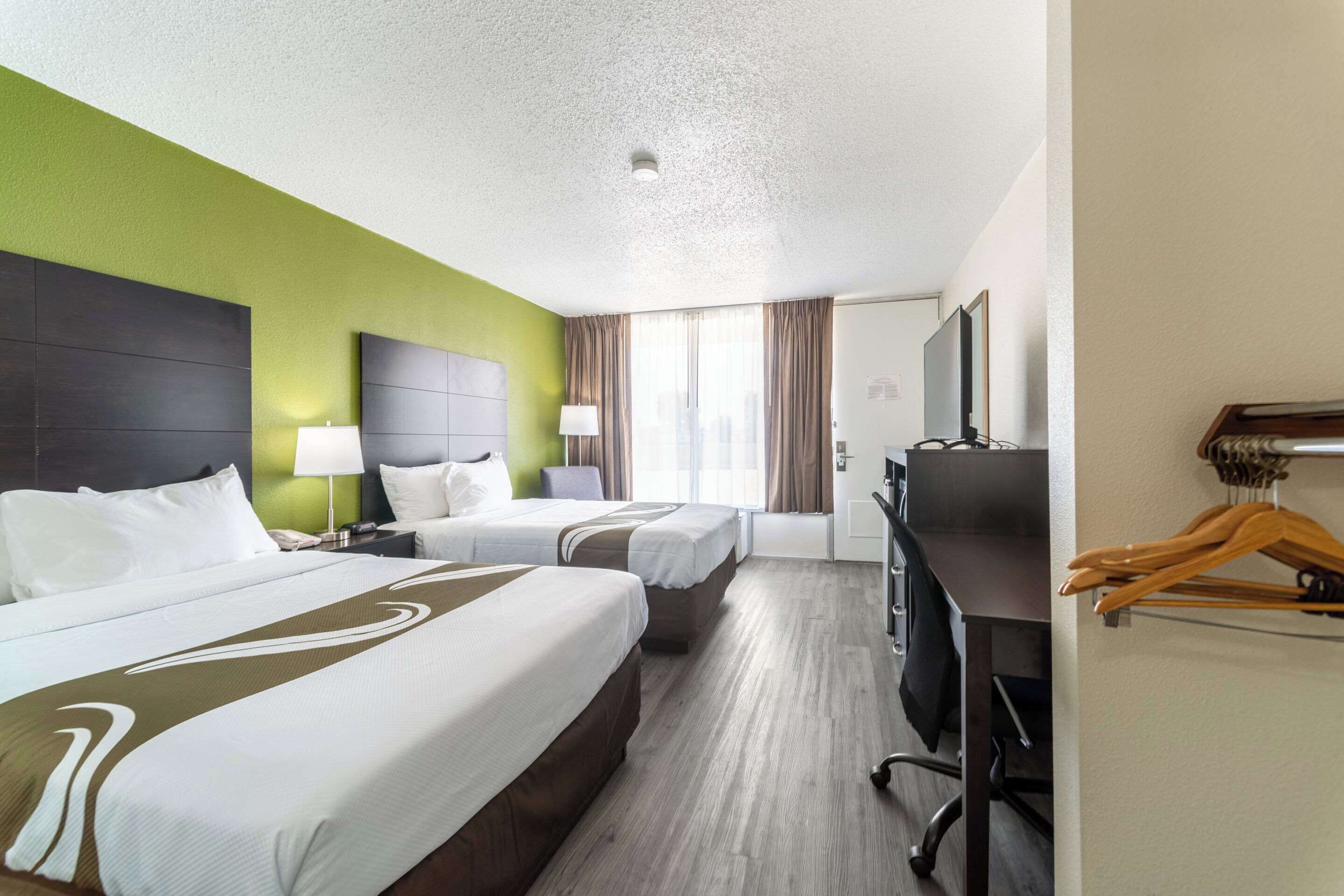 business room, 2 double beds, accessible, non smoking (efficiency) | in-room safe, desk, iron/ironing board, cots/infant beds