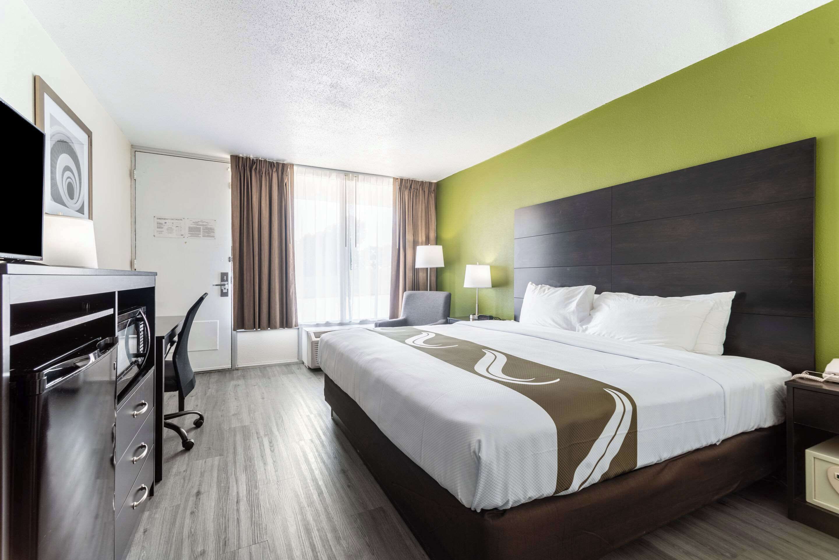 room, 1 king bed, accessible, non smoking | in-room safe, desk, iron/ironing board, cots/infant beds