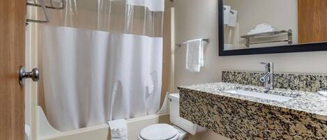 Standard Room, 1 King Bed, Non Smoking | Bathroom | Combined shower/tub, free toiletries, hair dryer, towels