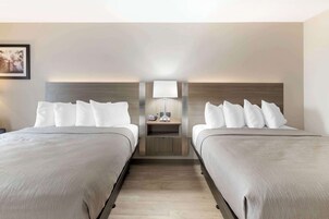 Standard Room, 2 Queen Beds, Non Smoking | Desk, laptop workspace, iron/ironing board, cribs/infant beds