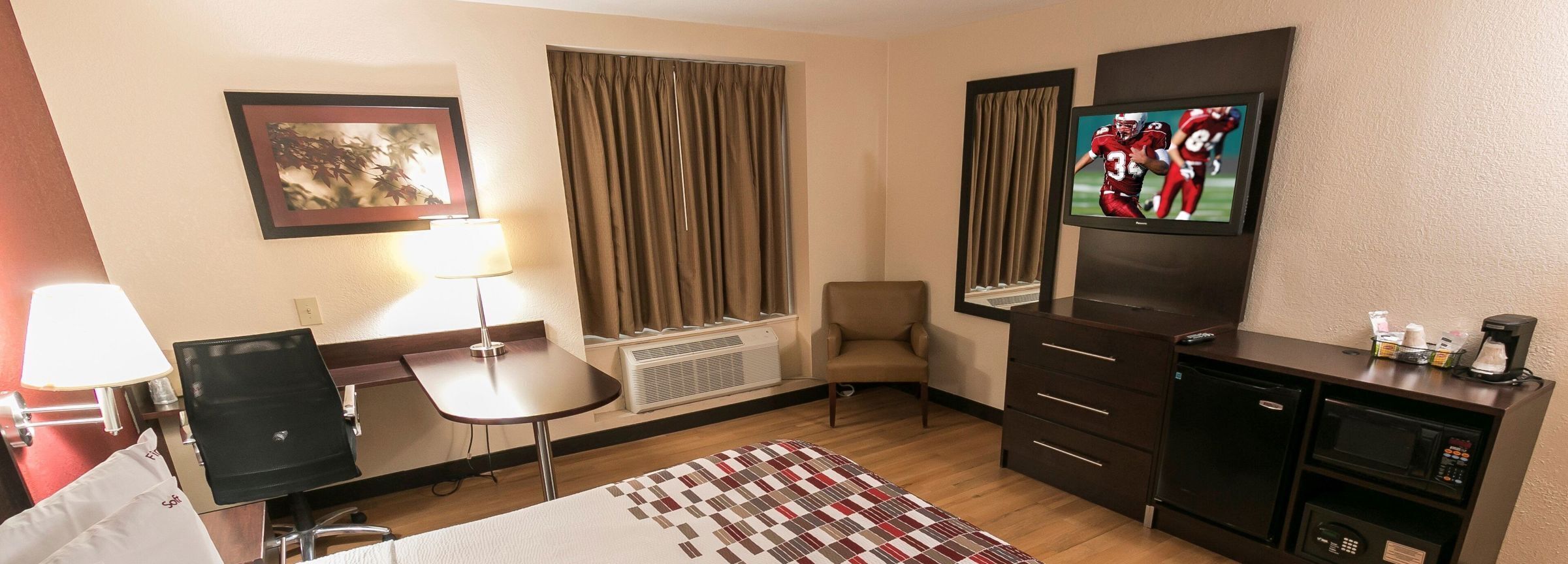 Desk, blackout curtains, free WiFi, bed sheets