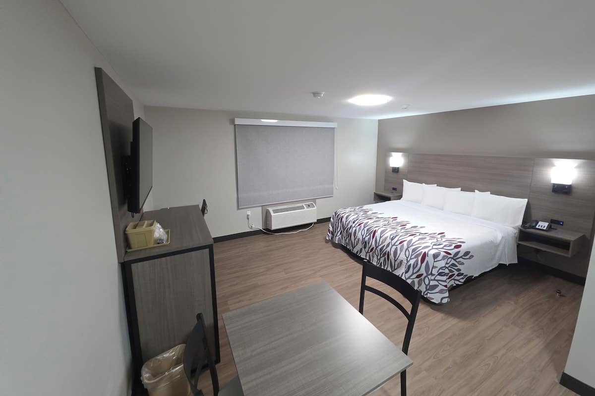 Desk, blackout curtains, free WiFi, bed sheets