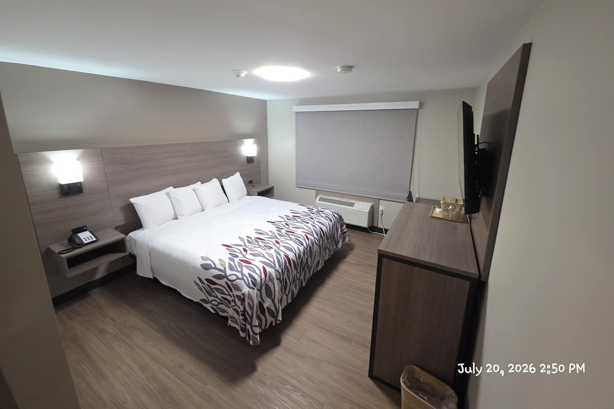 Deluxe-Zimmer, 1 King-Bett, Nichtraucher | Schreibtisch, Verdunkelungsvorhänge, kostenloses WLAN, Bettwäsche