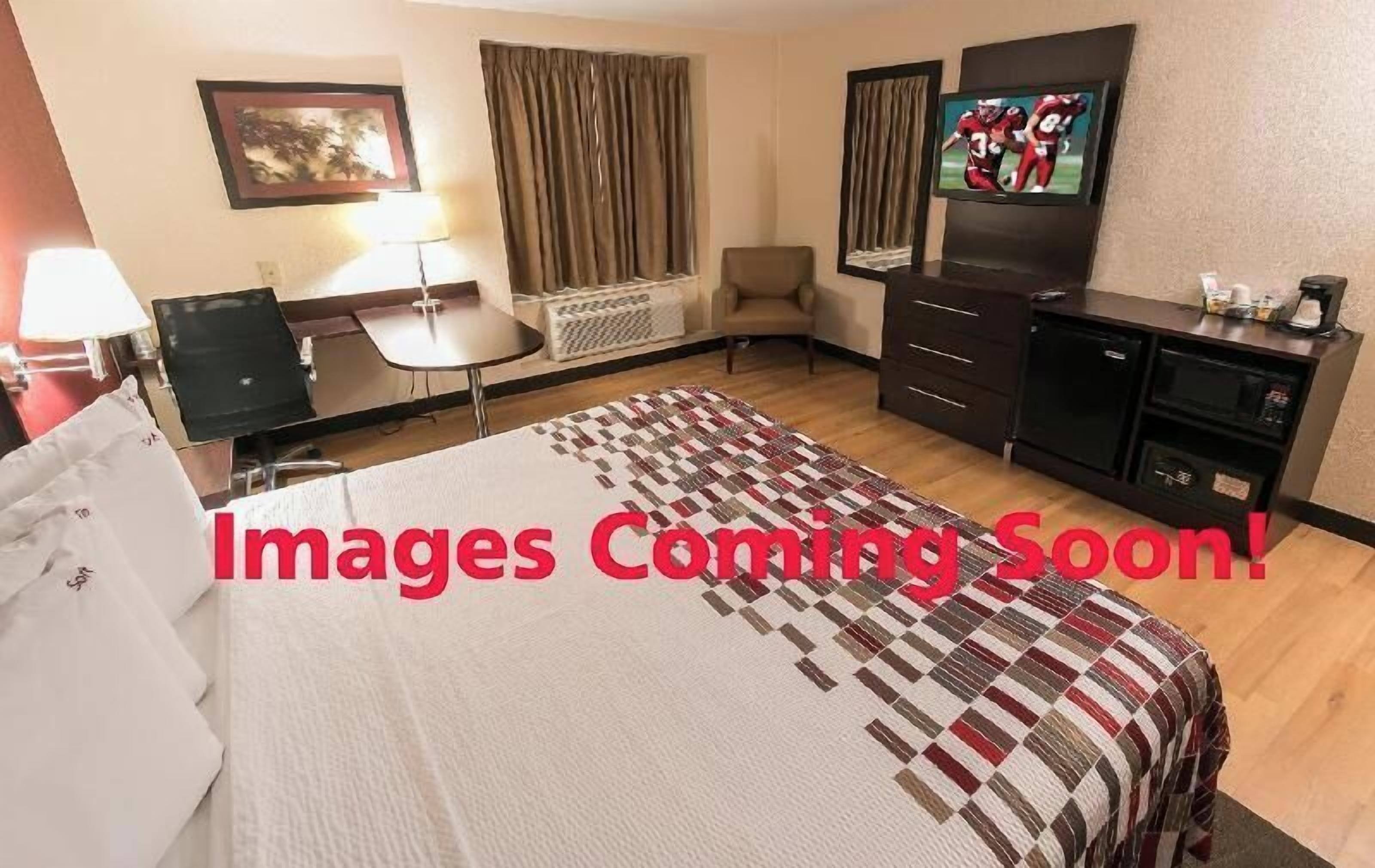 Desk, blackout curtains, free WiFi, bed sheets