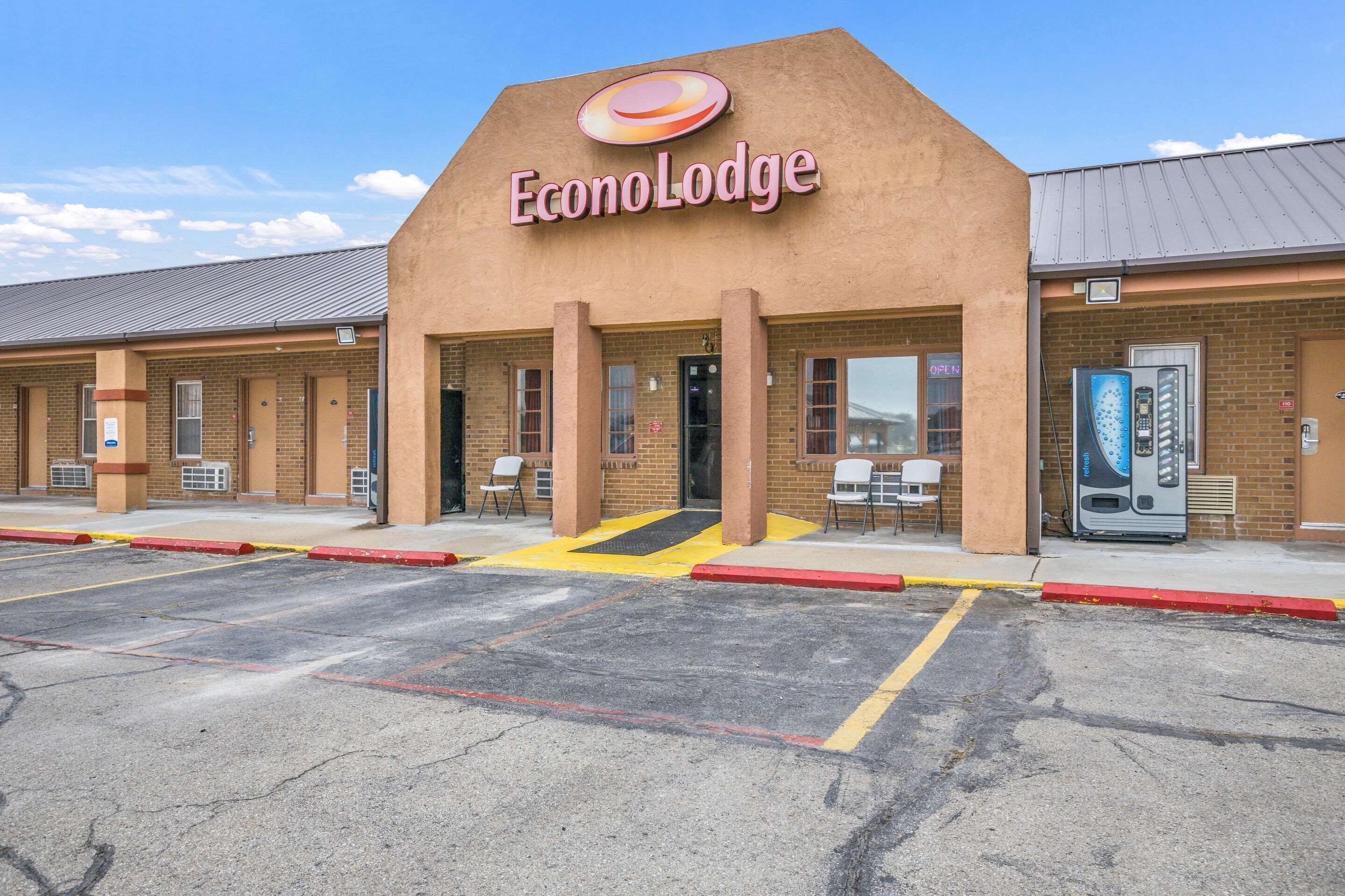A brick building with a sign reading "EconoLodge".