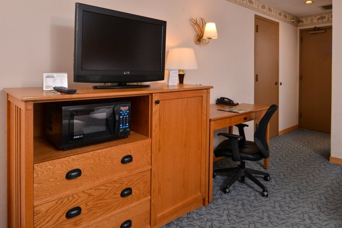 deluxe room, 2 queen beds | television