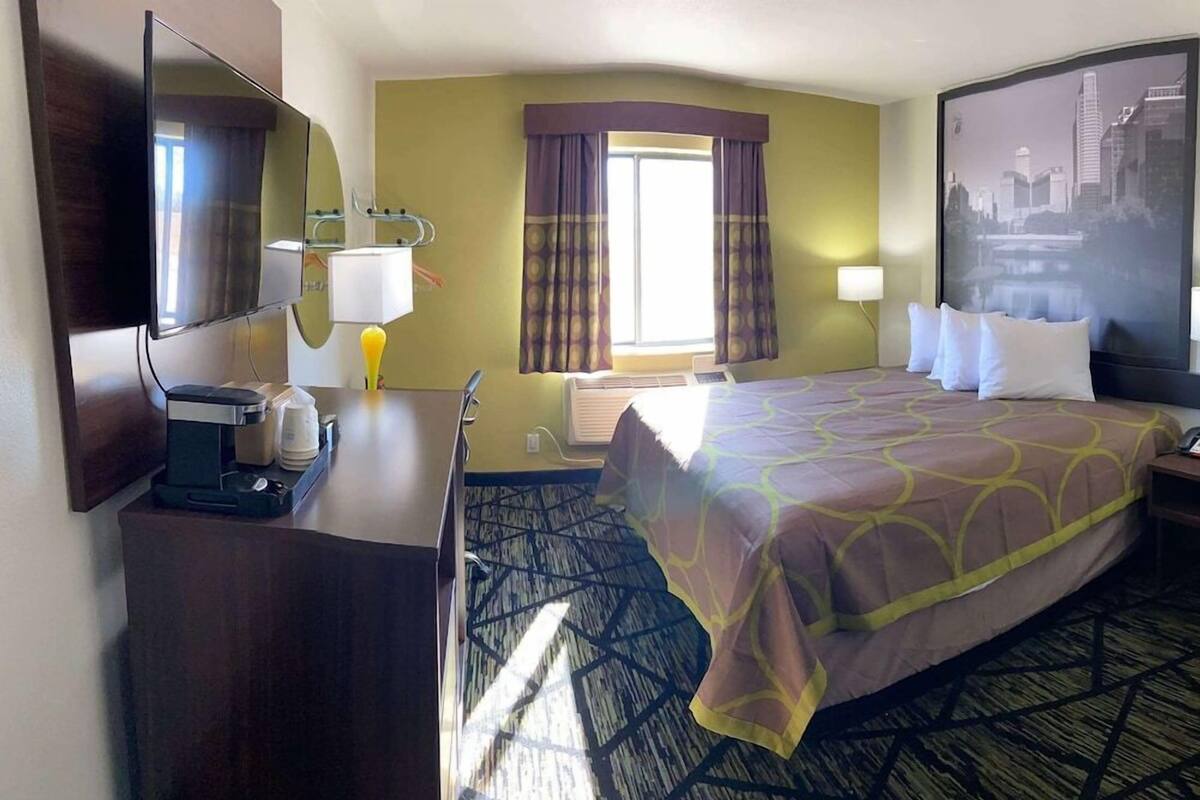 Desk, laptop workspace, free WiFi, bed sheets