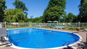 A rectangular pool with a white edge and a red line marking the 3-foot depth. - Days Inn by Wyndham Nanuet / Spring Valley (Nanuet)