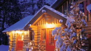 Front of property - evening/night - The Point (Saranac Lake)