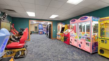 Enjoy games and entertainment in our indoor arcade featuring claw machines and a racing game.