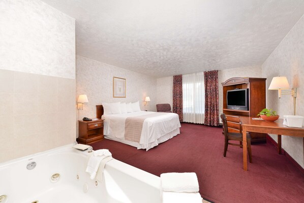 Suite, 1 King Bed, Non Smoking (Jacuzzi) | Desk, iron/ironing board, cots/infant beds, free WiFi