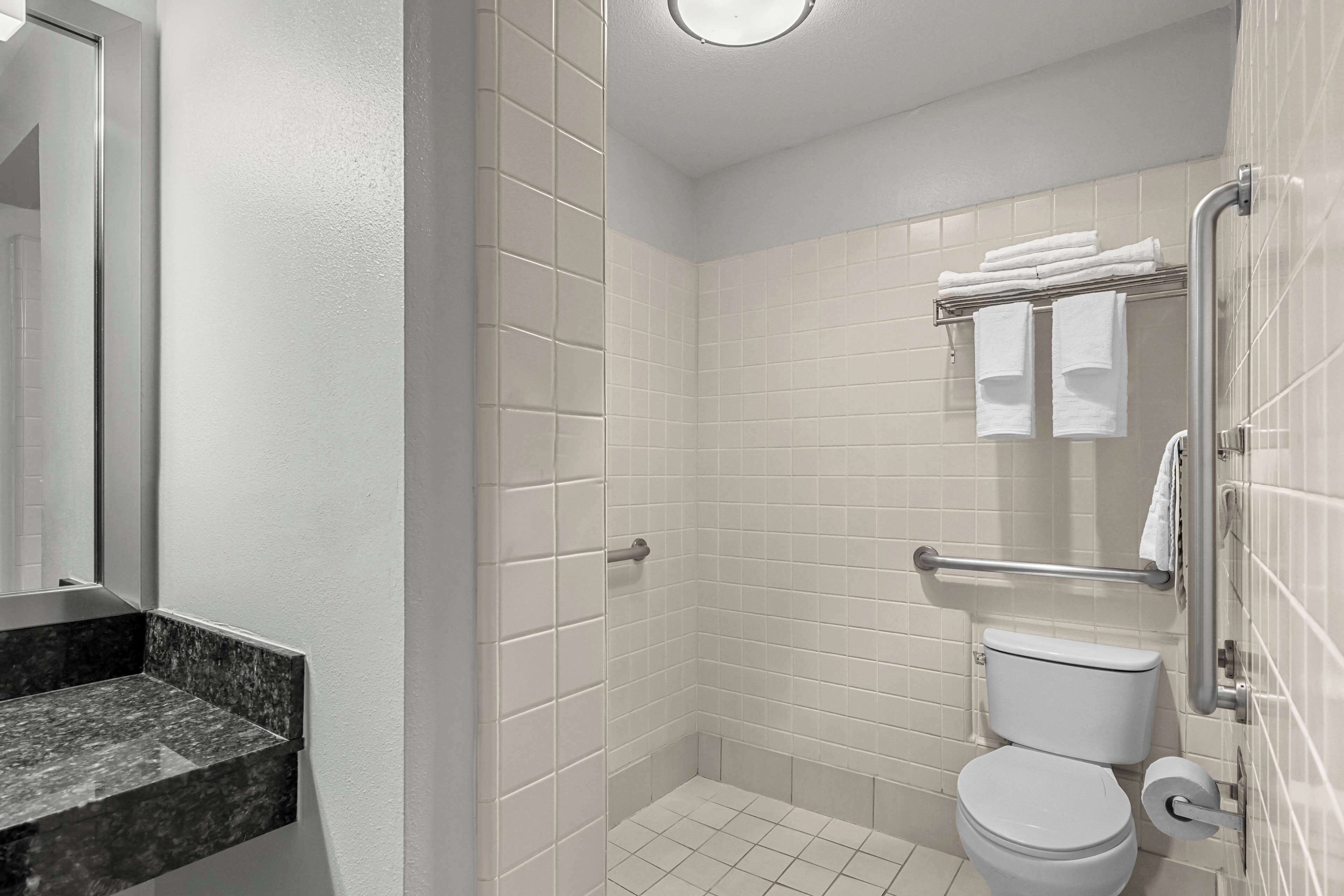 standard room, 2 queen beds, accessible, non smoking | bathroom | combined shower/bathtub, free toiletries, hair dryer, towels