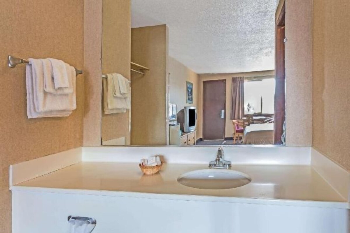 In-room safe, laptop workspace, blackout curtains, iron/ironing board