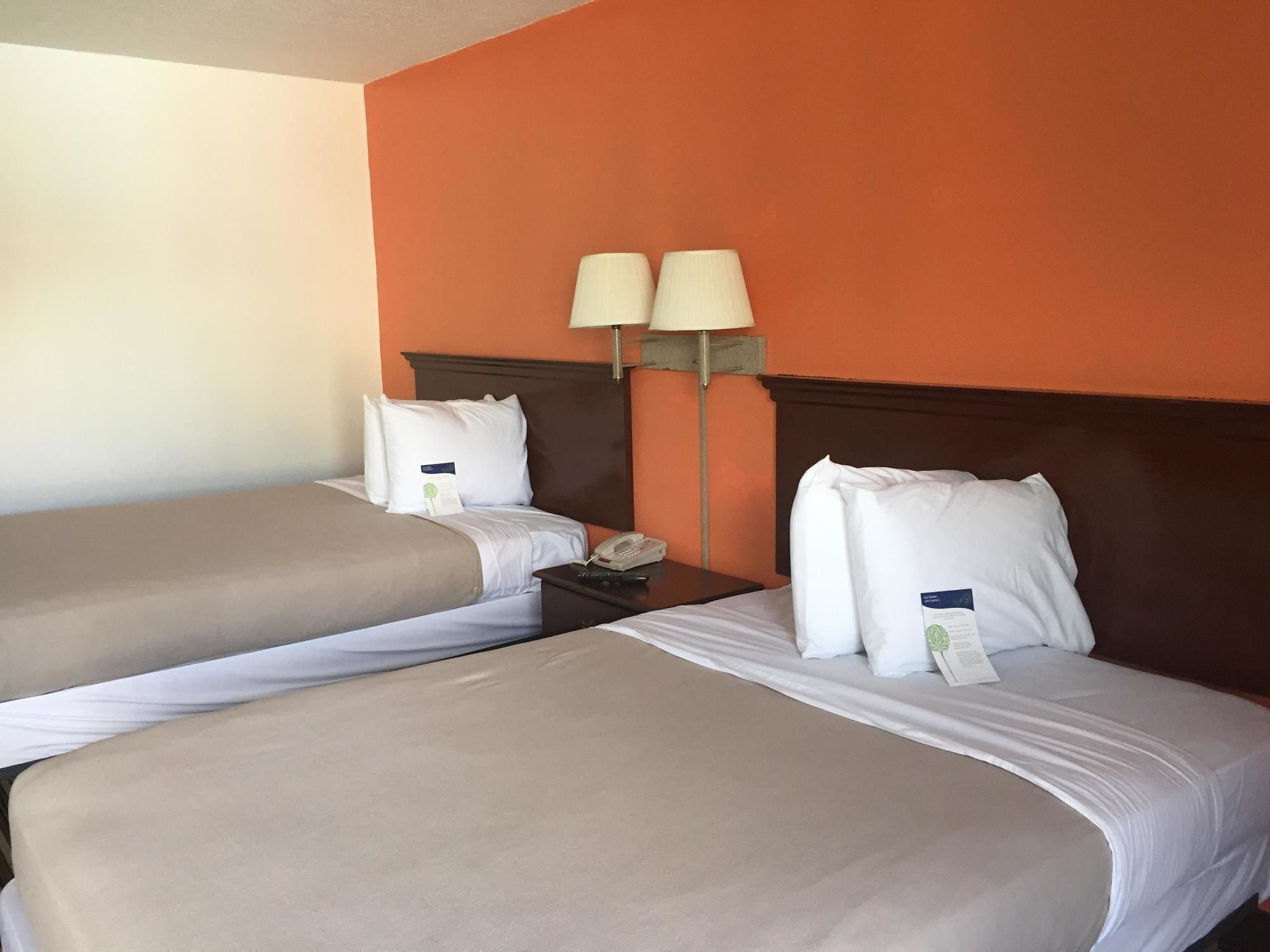 Desk, free WiFi, bed sheets, alarm clocks