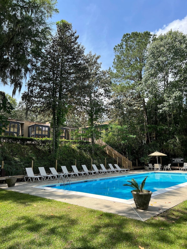 Outdoor pool, pool umbrellas, sun loungers