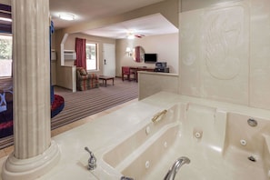 Suite, 1 King Bed, Hot Tub | Desk, iron/ironing board, free WiFi, bed sheets