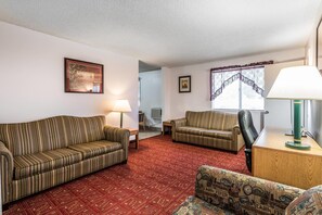 Suite, 1 Queen Bed, Non Smoking | 1 bedroom, rollaway beds, free WiFi, bed sheets