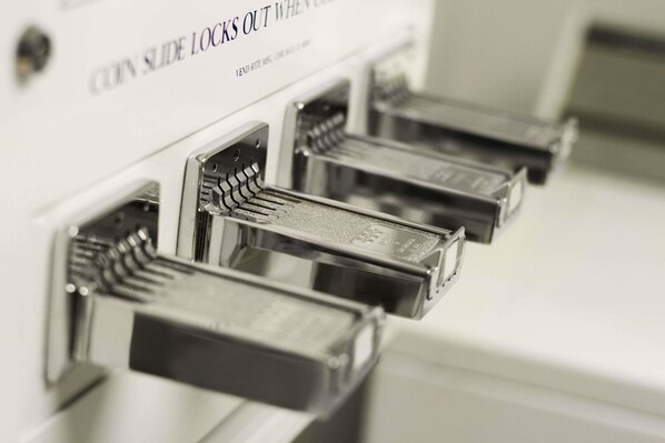 A coin slide lock mechanism.