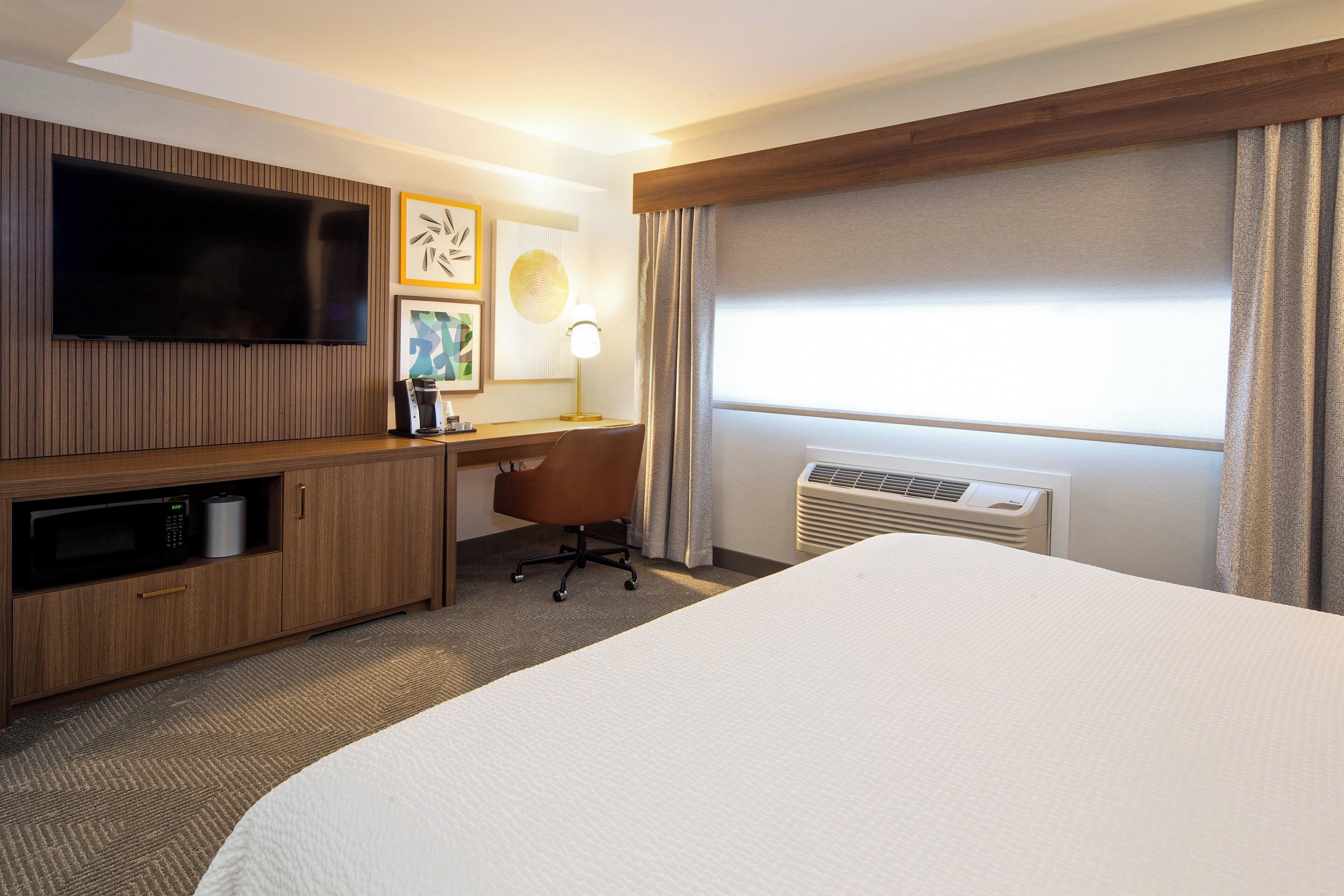 Coffres-forts dans les chambres, bureau, fer et planche à repasser