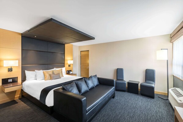 Executive Suite, 1 King Bed (Longterm Suite) | Hypo-allergenic bedding, in-room safe, desk, blackout drapes - Ramada Plaza by Wyndham Prince George (Prince George)