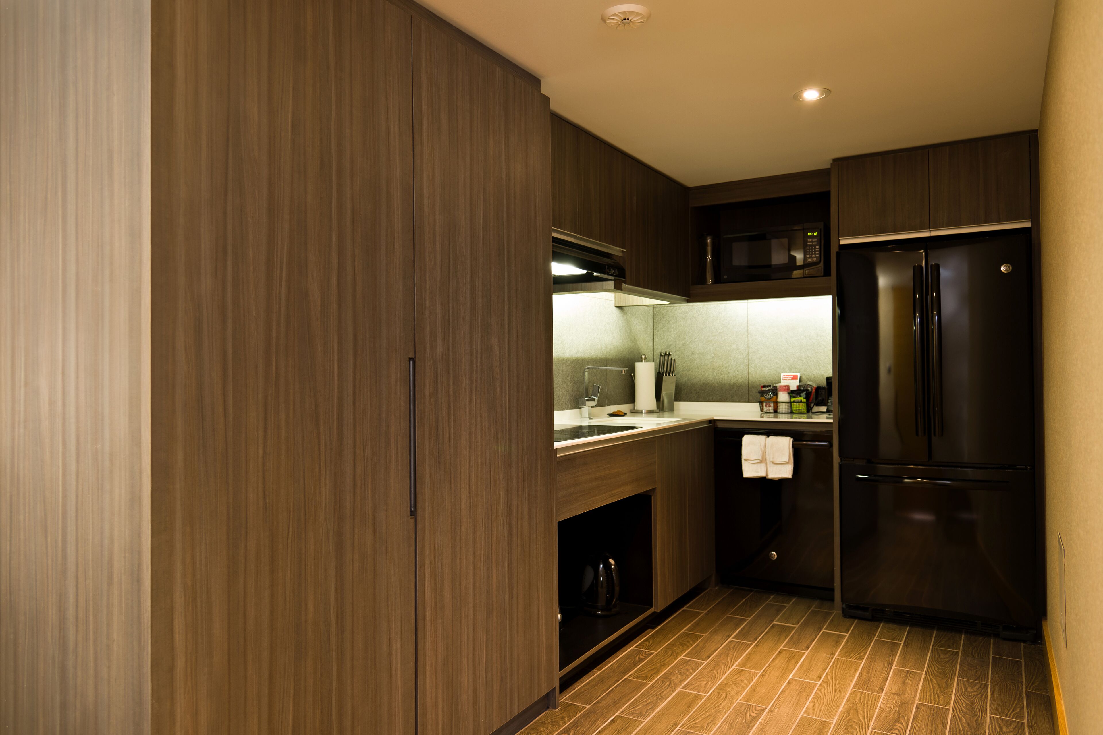 executive suite, 1 king bed (longterm suite) | private kitchenette | coffee/tea maker, eco-friendly cleaning products