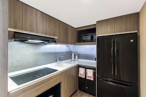 Executive Suite, 1 King Bed (Longterm Suite) | Hypo-allergenic bedding, in-room safe, desk, blackout curtains