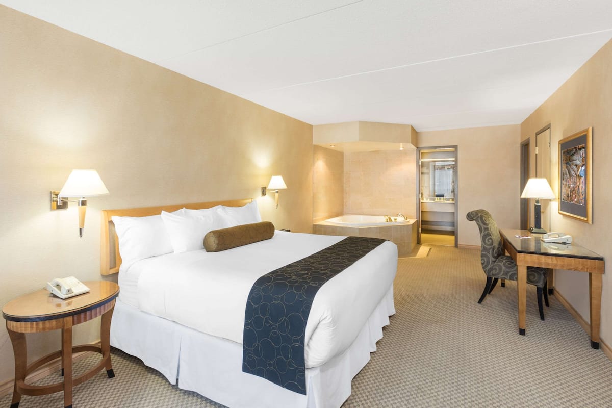 Presidential Suite, 1 King Bed (One-Bedroom Suite) | Hypo-allergenic bedding, in-room safe, desk, blackout drapes