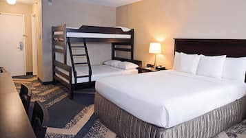 Desk, laptop workspace, blackout drapes, iron/ironing board