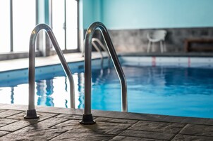 Indoor pool, open 7:00 AM to 11:00 PM, sun loungers