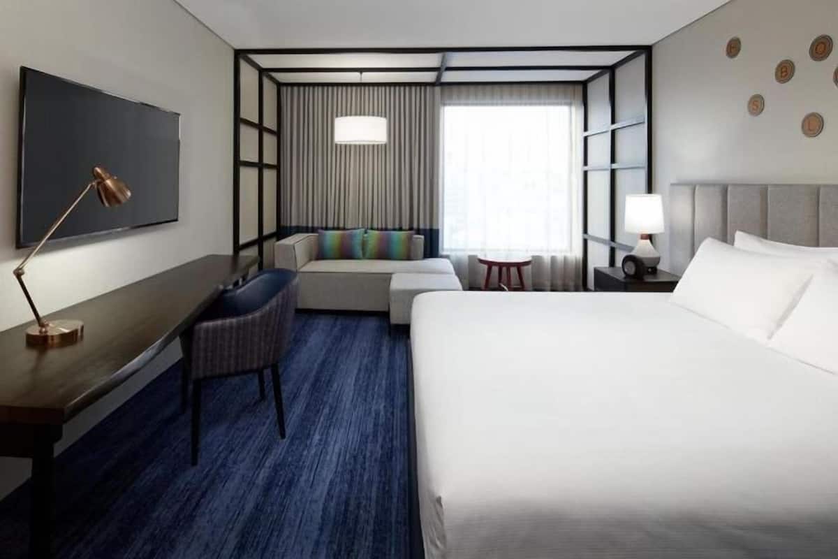 Premium bedding, pillow-top beds, in-room safe, laptop workspace