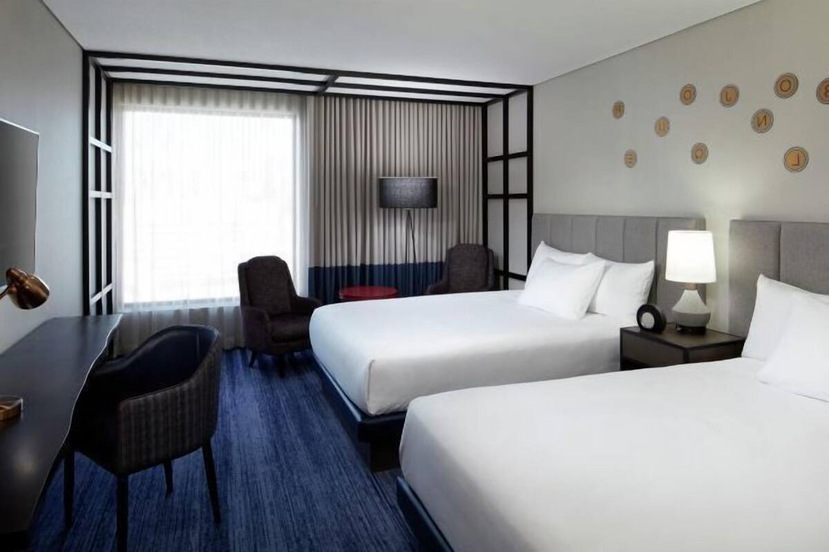 Premium bedding, pillow-top beds, in-room safe, laptop workspace