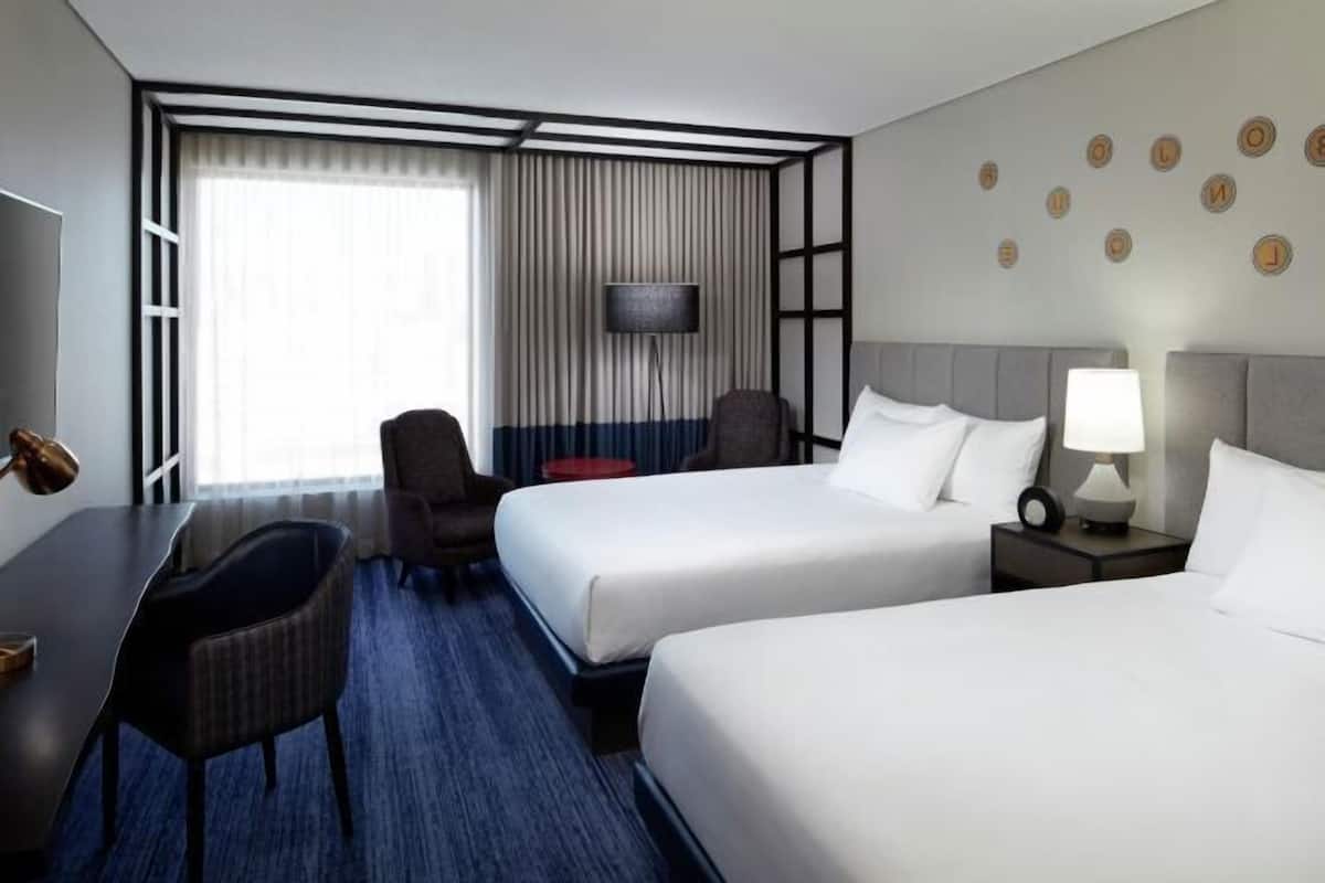 Premium bedding, pillow-top beds, in-room safe, laptop workspace