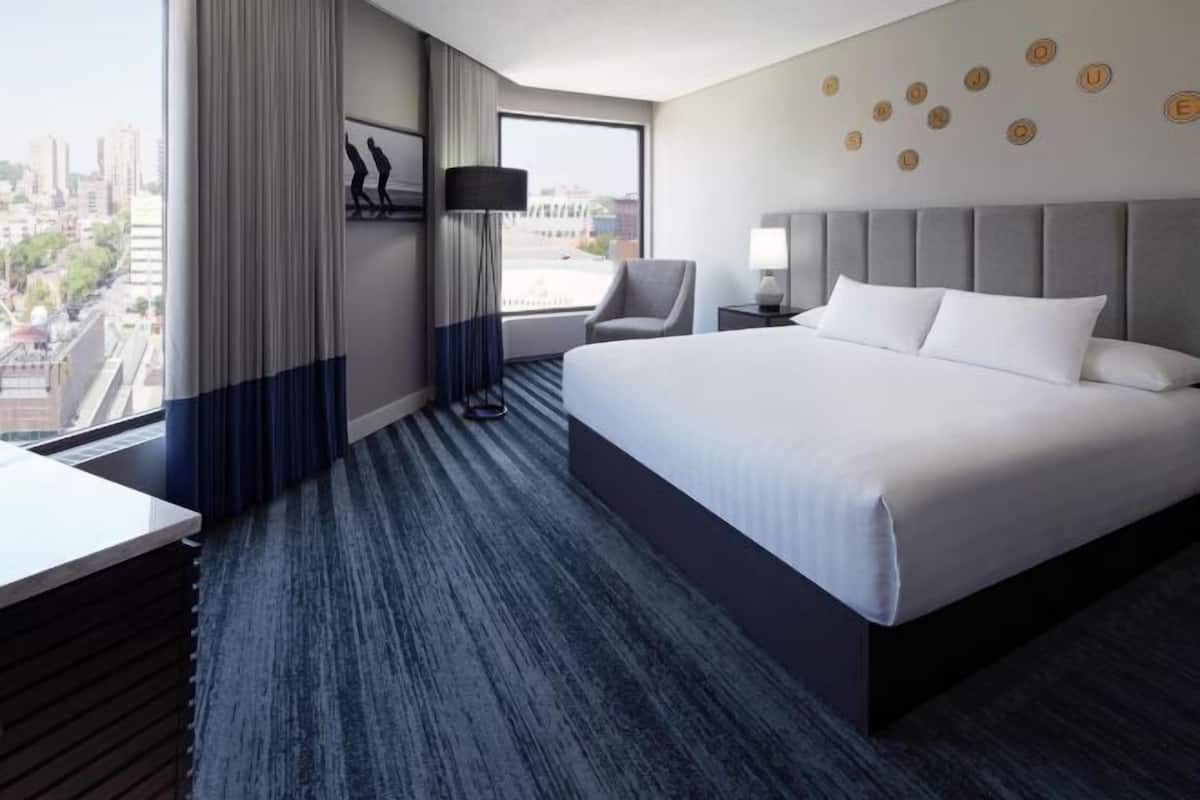 Premium bedding, pillow-top beds, in-room safe, laptop workspace