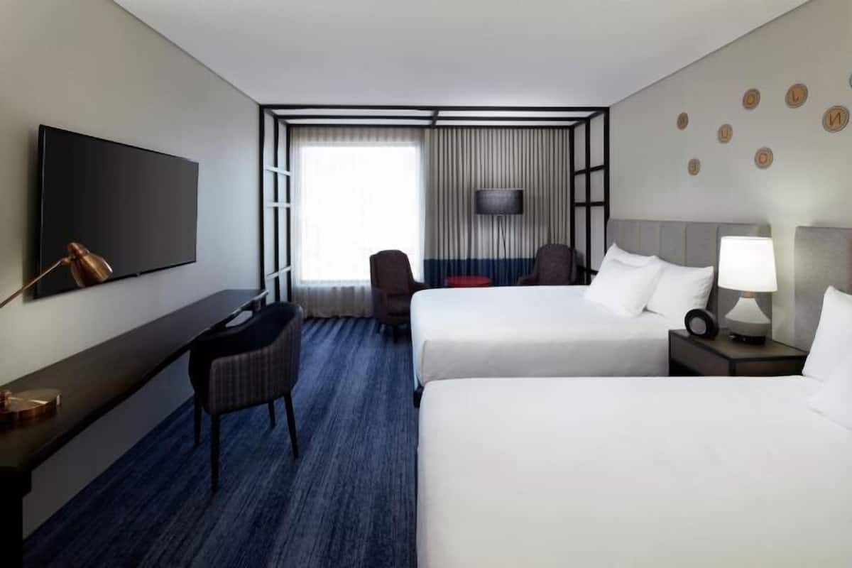 Premium bedding, pillow-top beds, in-room safe, laptop workspace