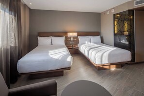 Room, 2 Double Beds, City View | In-room safe, desk, laptop workspace, blackout drapes
