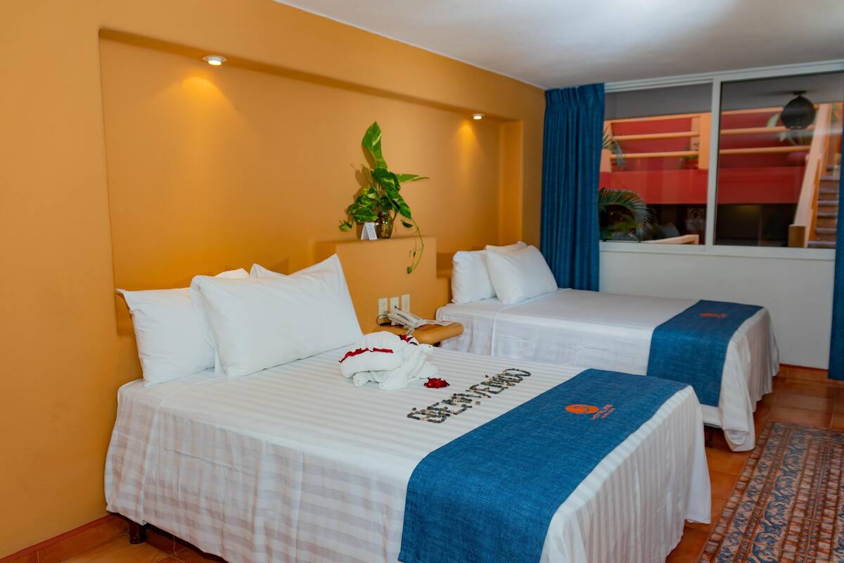Premium bedding, down comforters, in-room safe, blackout drapes