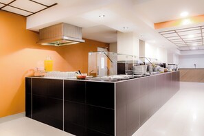 Breakfast, lunch, dinner served; international cuisine, pool views 