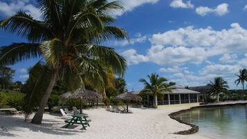 Private beach, white sand, beach umbrellas, beach towels