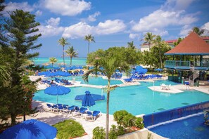 Outdoor pool, sun loungers, lifeguards on site