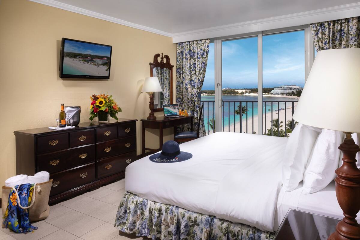 Partial Ocean View Room | Hypo-allergenic bedding available, in-room safe, desk, laptop workspace