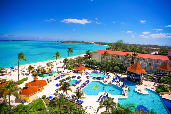 Outdoor pool, sun loungers, lifeguards on site