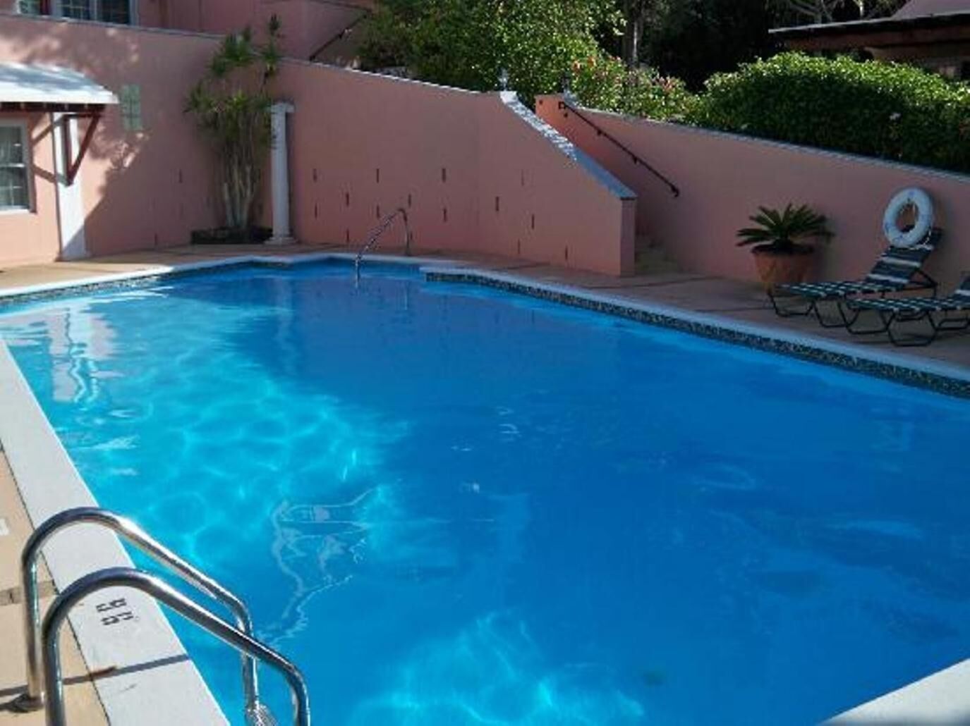 outdoor pool, pool loungers