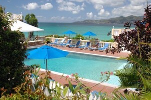 Outdoor pool, pool umbrellas, sun loungers