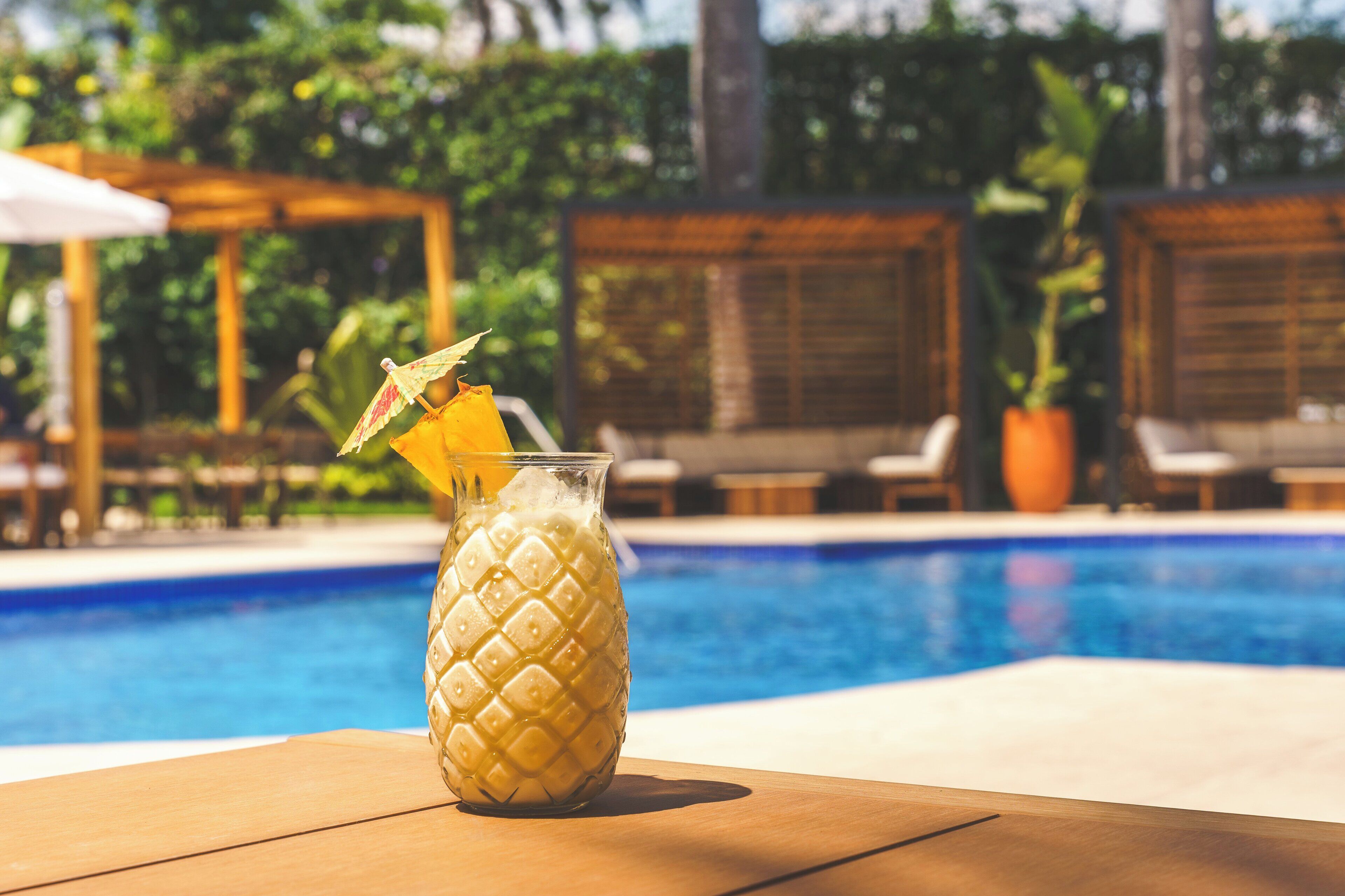 Outdoor pool, open 6:30 AM to 10:00 PM, pool umbrellas, pool loungers